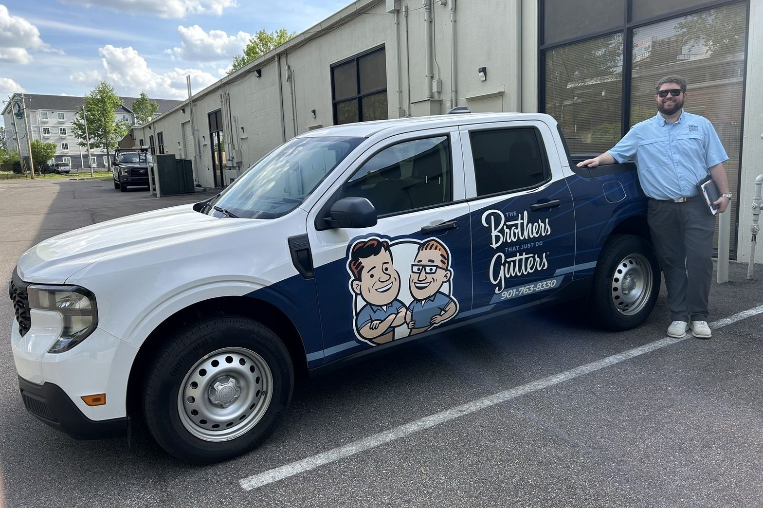 A Central Mid-South Solutionist beside the branded pickup